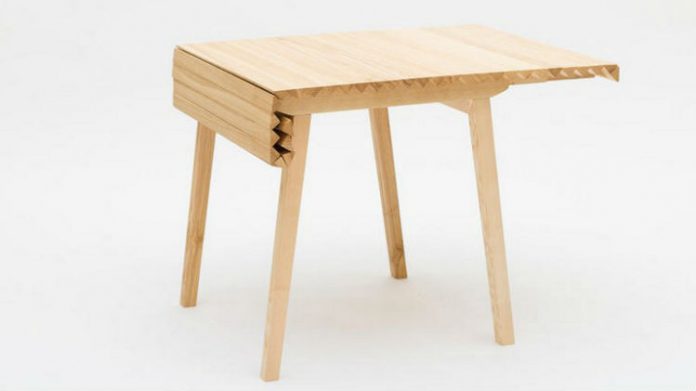 Nietypowo składany st&oacute;ł - blat jak gąsienica czołgu